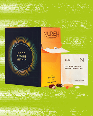 Nurish by Nature Made vitamin pack over green background
