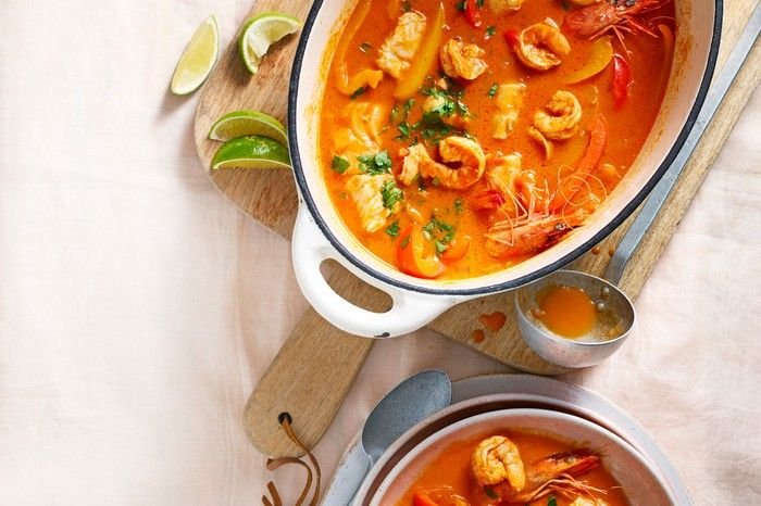 A fish stew in a serving bowl