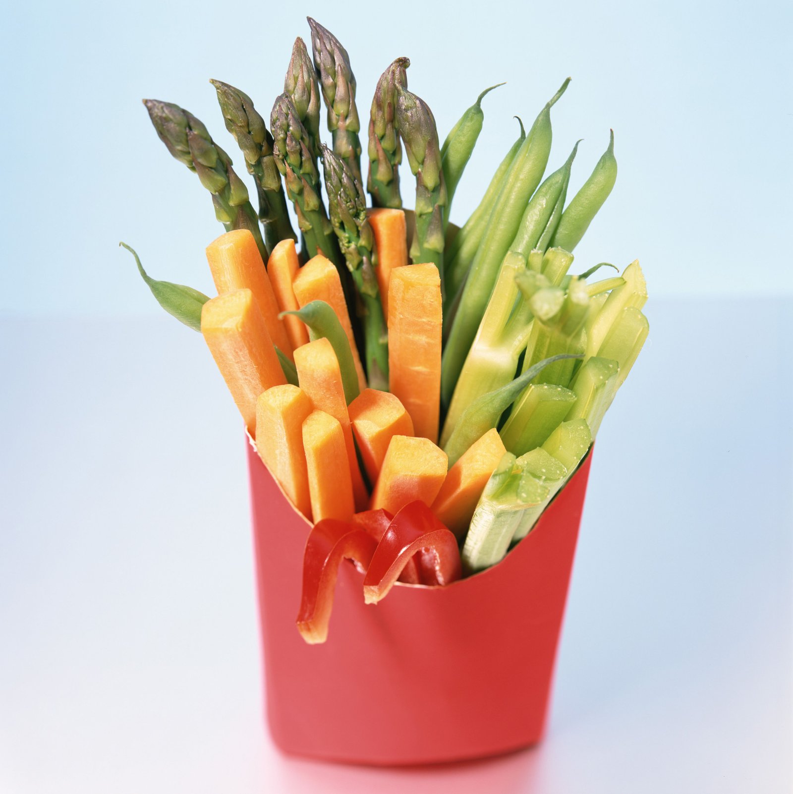 veggies cut into straws in a french fry container